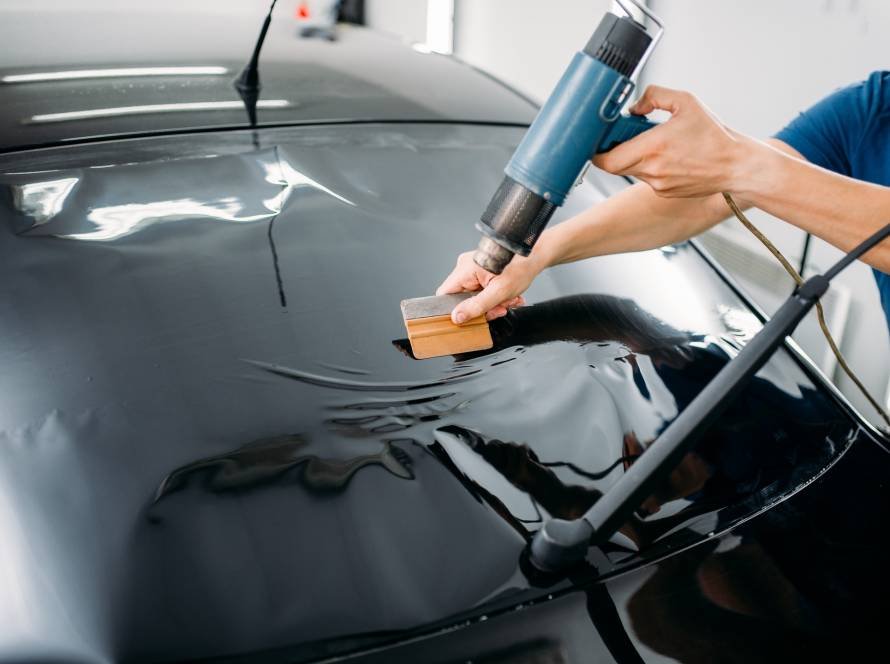 Specialist with drier, tinting film installation